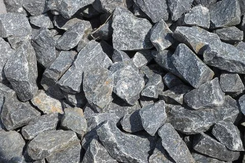 Natural gray stone. Granite background. Stock Photos