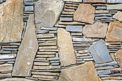 Natural gray stone wall texture Stock Photos