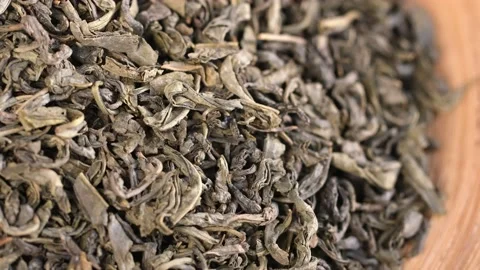 Natural Green Tea, Macro, Dry Healthy Herbs, Isolated, Rotation. Background of Video stock 167790165