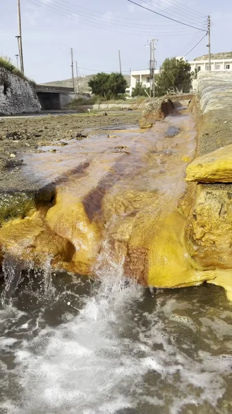 Natural Hot Spring Stream with Mineral Rocks in Greece Stock Footage 336964987