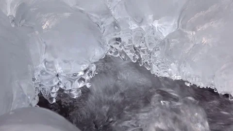 Natural ice formations at brook in winter, Ice layer, icycle, 4K Stock Footage 74783808