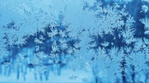 Natural ice patterns on winter window Stock Photos