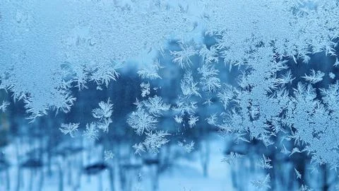 Natural ice patterns on winter window Stock Photos