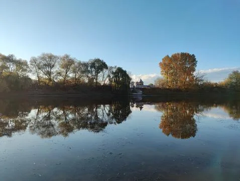 Natural landscape with reflection. reflection of trees in water. trees and .. Stock Photos