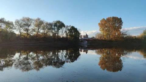 Natural landscape with reflection. reflection of trees in water. trees and .. 写真素材