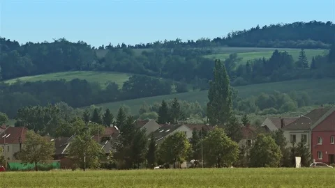 Natural landscape of summer field and low old mountain, time lapse speed30x Stock Footage 79983053