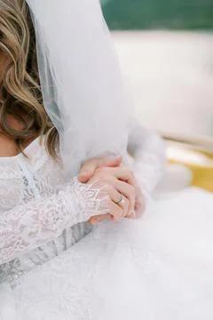Natural Light Illuminates Bride Preparing With Delicate Touch 스톡 사진
