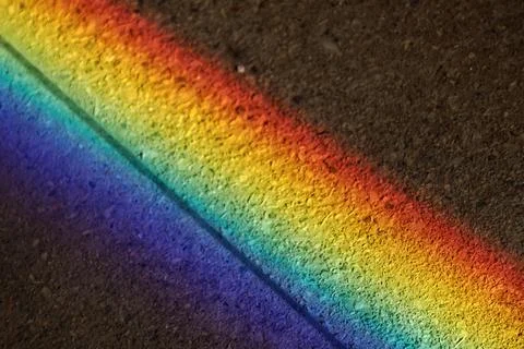 Natural Light refraction in Rainbow inside ancient stone building Foto stock