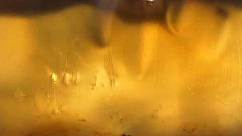 Natural light through cola in plastic bag. Video stock 108407769