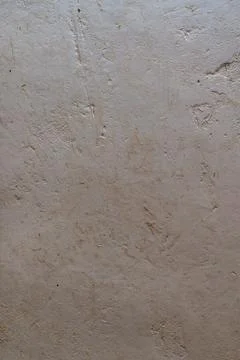 Natural lime plaster wall texture with subtle imperfections and surface pattern Stock Photos
