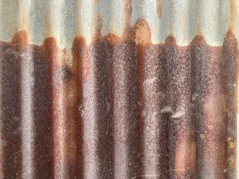 The natural lines pattern of silver-brown old rust zinc sheets Stock Photos