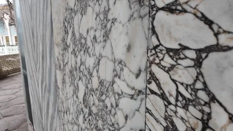 Natural marble stone wall textures showing unique patterns and veins in sid.. 動画素材 332625856