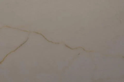 Natural marble surface with unique veining patterns showcasing subtle colors and Stock Photos