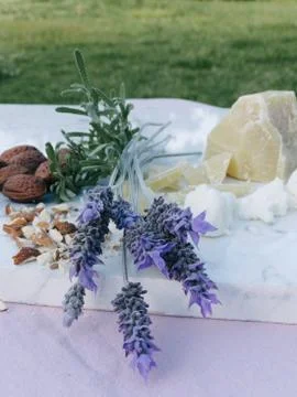 Natural medicine, elements to make ointment for pains. Almonds, Beeswax and L Stock Photos