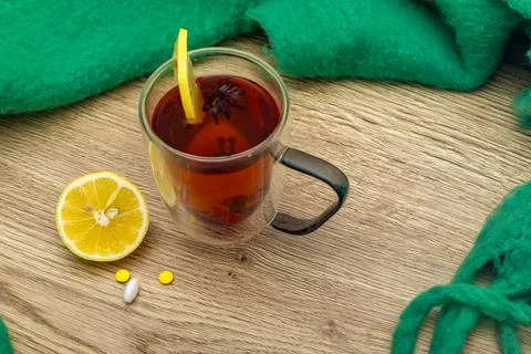 Natural methods of treating colds and flu, tea with alcohol, honey and lemo.. Stock Photos