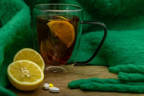 Natural methods of treating colds and flu, tea with alcohol, honey and lemo.. Stock Photos