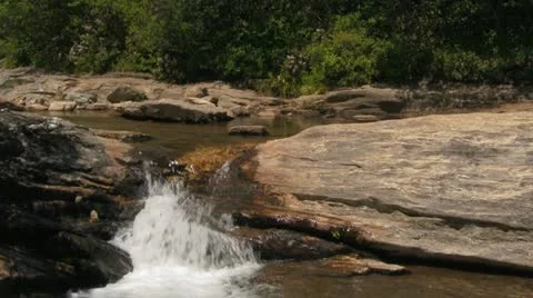 Natural Mountain River Flowing Down Over Stone and Rock Video stock 12835851
