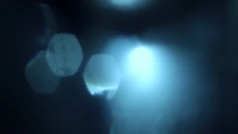 Natural moving light flare with hexagonal bokeh reflections 4k Stock Footage 233831919