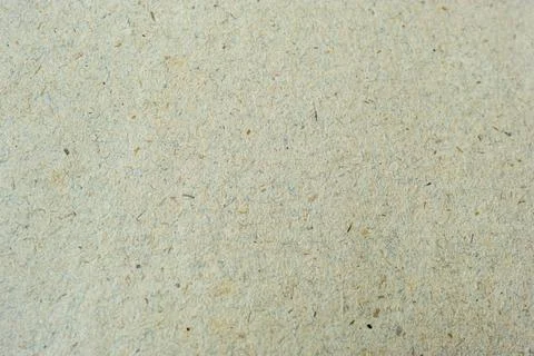 Natural old handmade paper with elements of wood and rags Stockfoto's