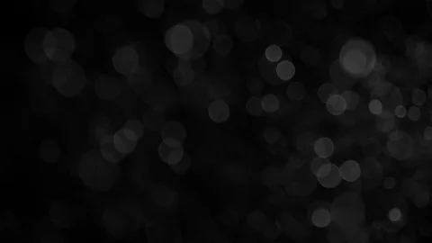 Natural Organic Dust Particles Float On Black Background. Dust In Motion. Vidéo 86498236