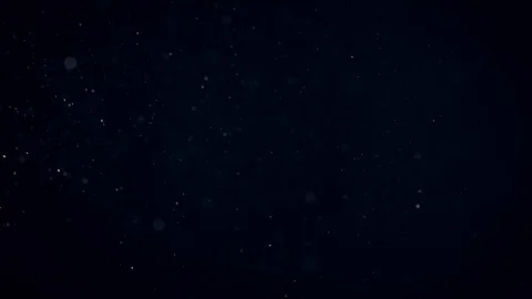 Natural Organic Dust Particles Float On Black Background. Dust In Motion. Vidéo 86559298