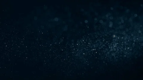 Natural Organic Dust Particles Float On Black Background. Dust In Motion. Vidéo 86782515