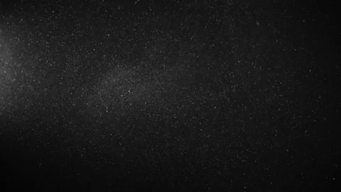 Natural Organic Dust Particles Float On Black Background. Dust In Motion. 库存影片 123391788