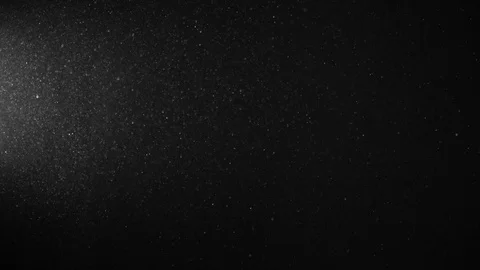Natural Organic Dust Particles Float On Black Background. Dust In Motion. 库存影片 123392241