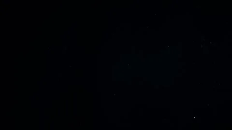 Natural Organic Dust Particles Float On Black Background. Dust In Motion. Stock Footage 247559239