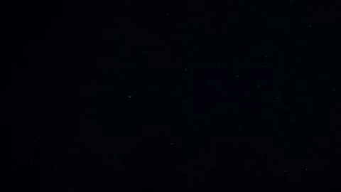 Natural Organic Dust Particles Float On Black Background. Dust In Motion. 库存影片 247578967