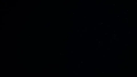 Natural Organic Dust Particles Float On Black Background. Dust In Motion. Stock Footage 247775537