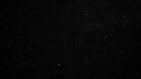 Natural organic dust particles floating on black background Stock Footage 125507333