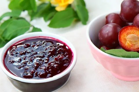 Natural organic plums on the table Stock Photos