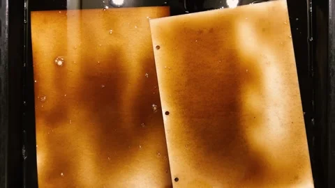 Natural paper dyeing process for junk journals and scrapbooking.  Stock Footage 330678582