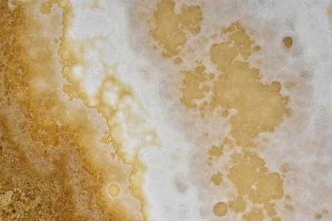 Natural pattern of onyx beige colour polished disc mineral. Super high Stock Photos