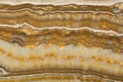 Natural pattern of onyx beige colour polished disc mineral. Super high Stock Photos