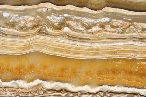 Natural pattern of onyx beige colour polished disc mineral. Super high Stock Photos