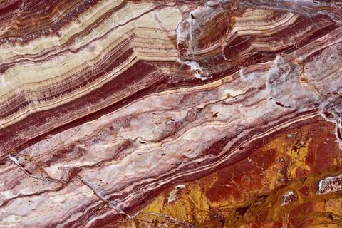 Natural pattern of onyx red colour polished disc mineral. Super high resolution. Stock Photos