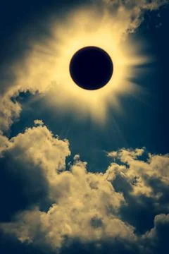 Natural phenomenon. Solar eclipse space with cloud on gold sky background. Stock Photos