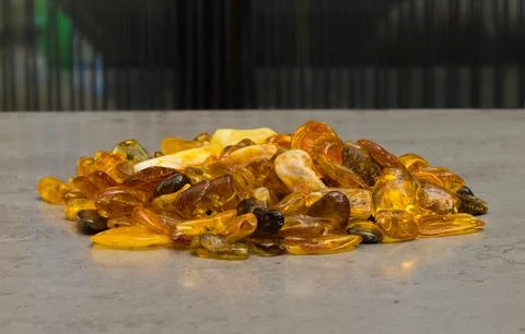 Natural, polished Baltic amber found on a beach in Kolobrzeg, Poland. Stock Photos