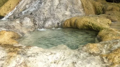 Natural pool view in the mountains with clear water flow Stock Footage 321321692