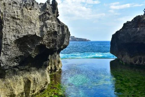 Natural pool with water from ocean. Angel's Billabong, Nusa Penida, Indonesia. Stock Photos