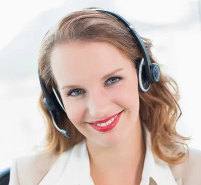 Natural pretty operator looking at camera Stock Photos