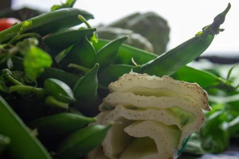 Natural raw vegetables on blue table. Stock Photos