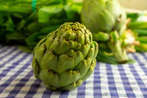 Natural raw vegetables on blue table. Stock Photos