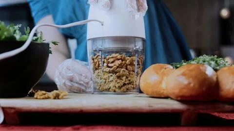 Natural recipe demonstration: grating beetroot into a fine texture Stock Photos