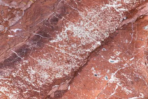 Natural red marble pattern with white veins, photo texture Stock Photos