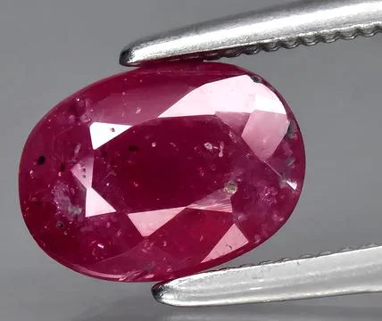 Natural red ruby corrundum gem on the background 写真素材