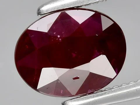 Natural red ruby corrundum gemstone on the background 写真素材