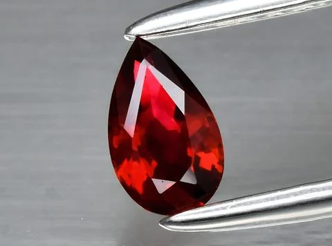 Natural red ruby gem on the background 写真素材